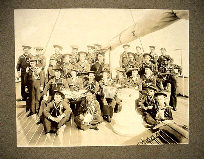 http://lighthouseantiques.net/Revenue%20Cutter%20Serv.htm Crew of the Gresham around 1900. Note the old school Donald Duck caps. 