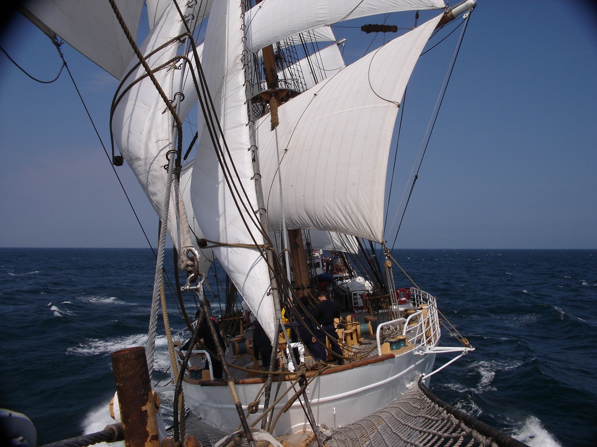 (June 26, 2005) ONBOARD THE USCGC EAGLE - A view from the bowsprit onboard the Eagle during a cadet summer training patrol.The U.S. Coast Guard Cutter EAGLE, designated 'America's Tallship' is a three masted, square- rigged sailing vessel. She is normally homeported in New London, Connecticut, and sails each summer for months at a time, visiting ports around the U.S. and abroad. EAGLE has a long history in service as a training vessel. After she was built and commissioned in 1936, she served as training vessel for cadets in the German Navy. In the 1940s, EAGLE began service as a training platform for Coast Guard Academy officer candidates. Today, nearly all future officers have the opportunity to sail onboard the EAGLE, learning skills such as leadership, teamwork, seamanship, and navigation. (Coast Guard photo by Ensign Ryan Beck)