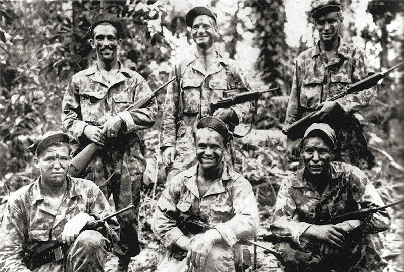 A team of Alamo Scouts pose for a photo after completing a reconnaissance mission on Los Negros Island, February 1944.