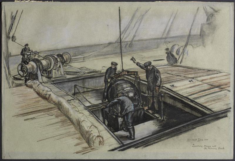 Lowering a mine into the mining deck, Dec. 1940