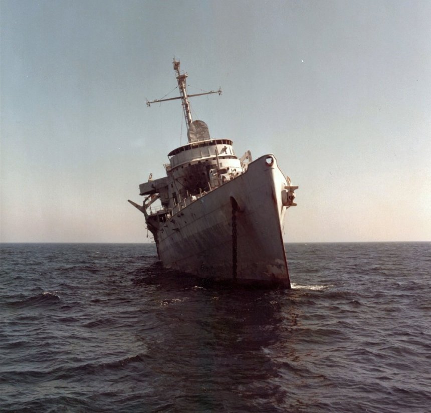This photo shows Ozark listing at 16 degrees to starboard 12 hours before she sank. Wikemedia Commons, Gordon Starr, photographer,