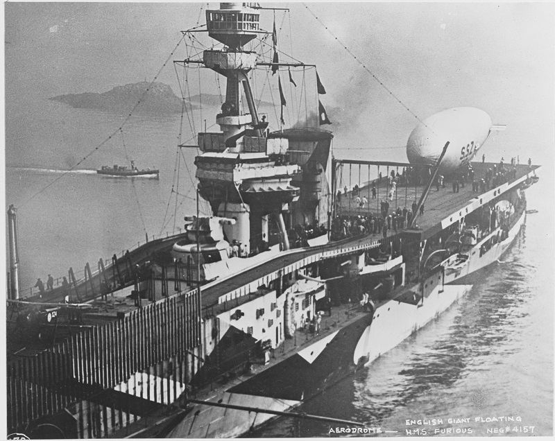 hms-furious-shortly-following-its-initial-conversion-and-in-dazzle-paint-scheme-in-1918-an-ssz-class-blimp-is-on-the-after-deck.jpg